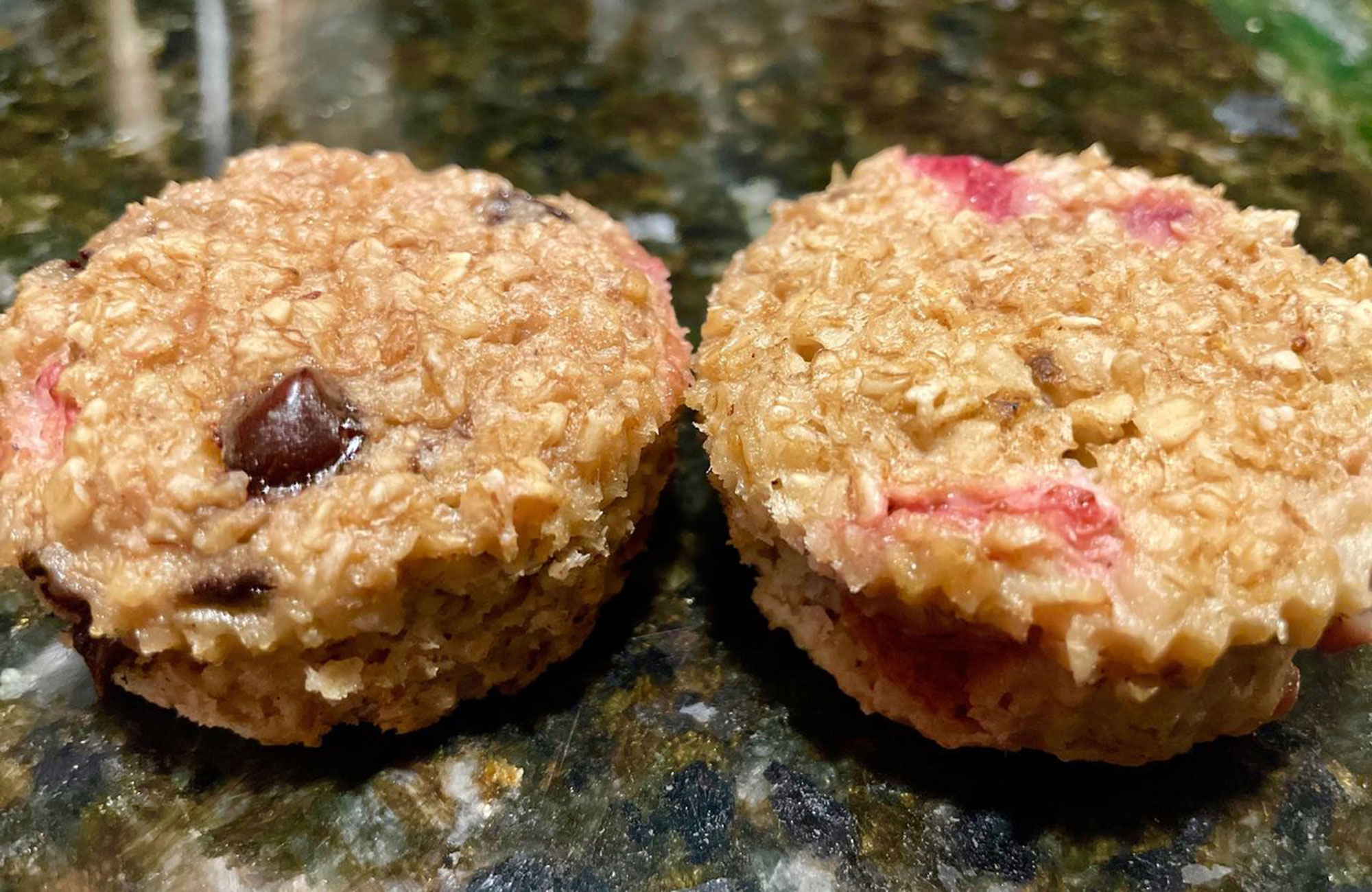 two strawberry baked oatmeal muffins