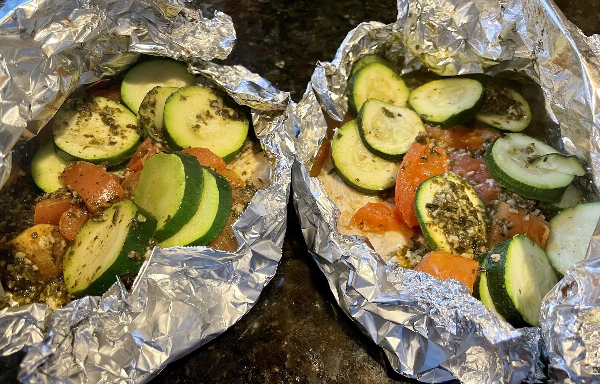 chicken pesto pockets wrapped in foil